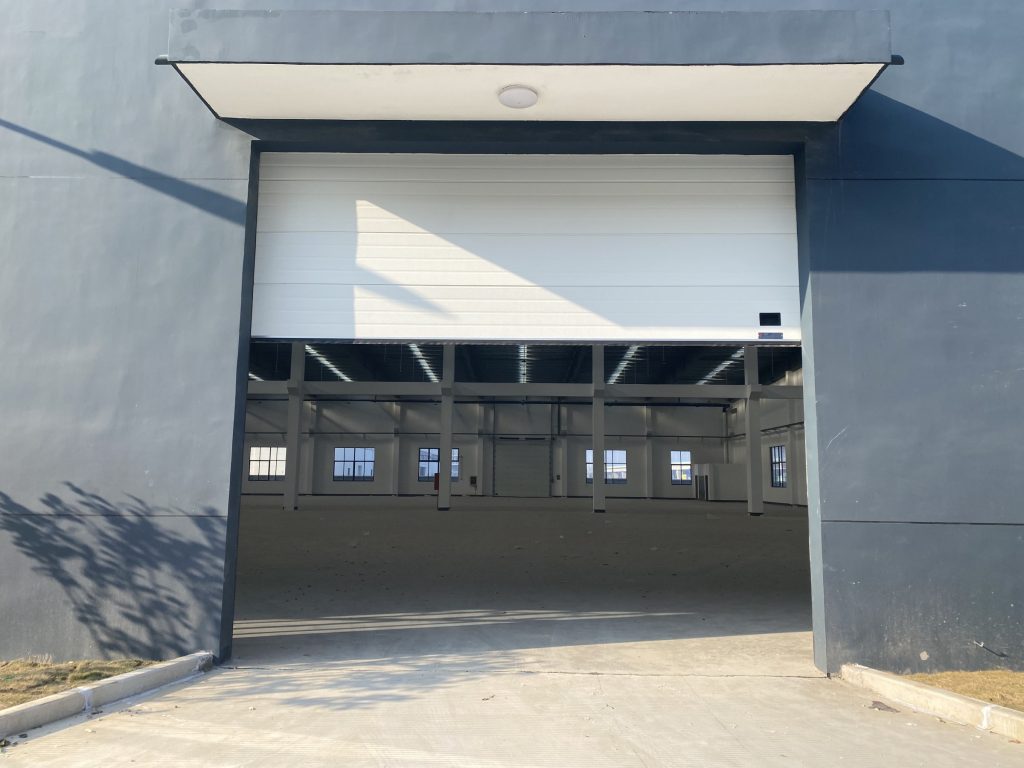 Elevate Efficiency with Steel Sectional Overhead Doors in Industrial ...